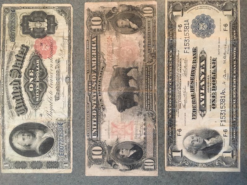A-Set-Of-Early-US-Currency-Including-Black-Eagles,-Educational-$2,-Etc